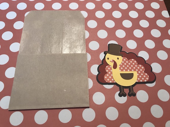 Cutting the brown paper bag to make table setting decoration