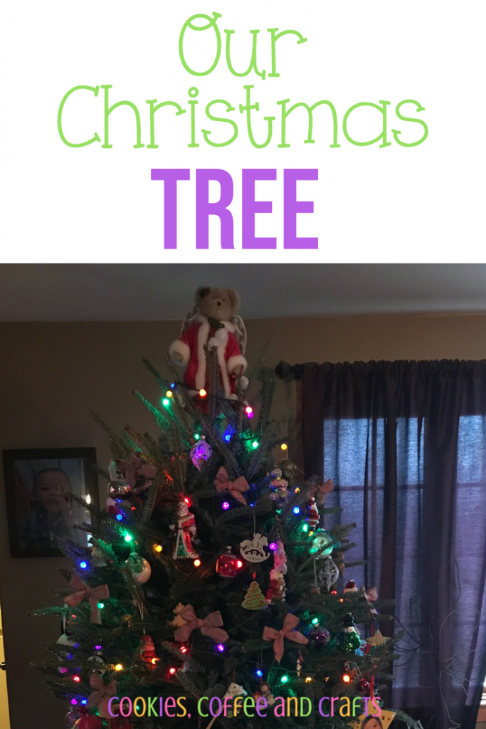 Our Christmas tree decorations tell our families story with beautiful ornaments, ribbon, and lights. It's a little country, some rustic, and some burlap, but overall it's a traditional Christmas tree. #Christmas #Xmas #ChristmasTree #ChristmasOrnaments #ChristmasLights #Traditional #ChrismtasIdeas #ChristmasDecor #DIY #Family