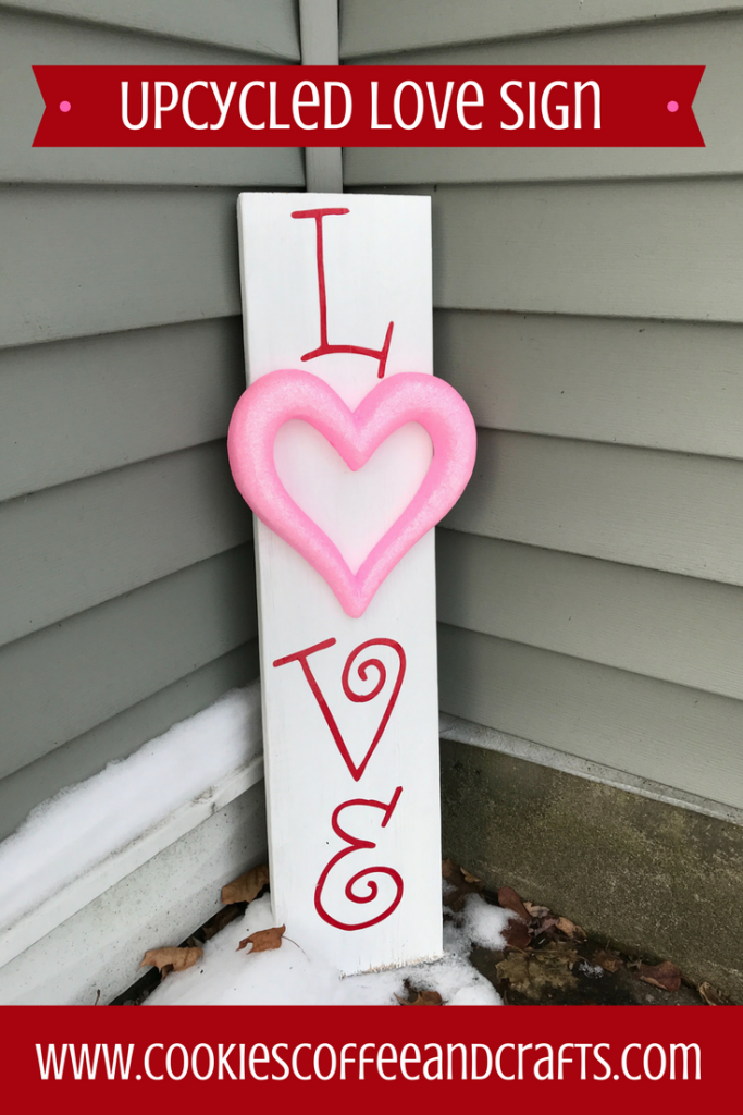 Add a touch of love to your home with this upcycled wooden love sign. This will look great on your front porch, just follow this easy and simple DIY. #ValentinesDay #ValentinesDayDecorations #DIY #porchsigns #repurposeit