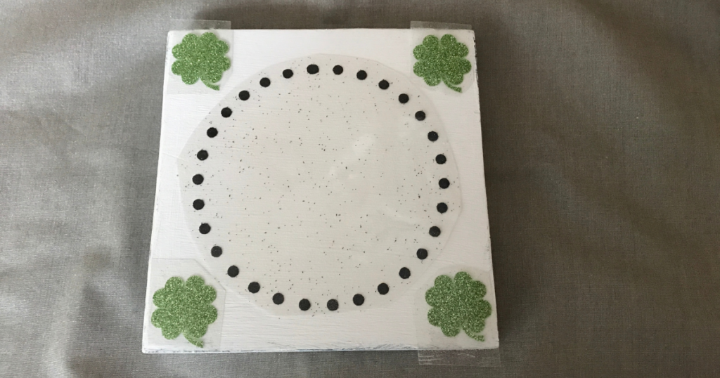 Layout the design and use the heat press to transfer the design to the DIY St. Patrick's Day Sign 