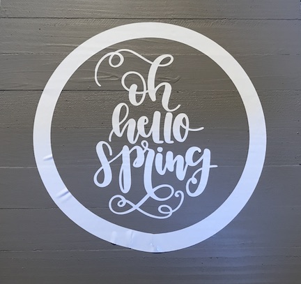 A Spring Farmhouse Kitchen Sign with flowers. Learn how to make this simple sign for $3 using the Cricut Maker and vinyl