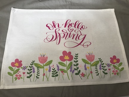 Make your table beautiful with these pretty spring placemats. Learn how to personalize them and create your own unique spring placemats using the Cricut and the Cricut Easypress