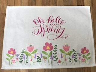 Make your table beautiful with these pretty spring placemats. Learn how to personalize them and create your own unique spring placemats using the Cricut and the Cricut Easypress