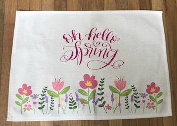 Make your table beautiful with these pretty spring placemats. Learn how to personalize them and create your own unique spring placemats using the Cricut and the Cricut Easypress