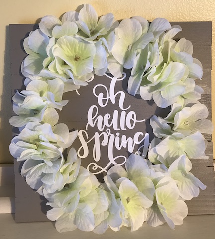 A Spring Farmhouse Kitchen Sign with flowers. Learn how to make this simple sign for $3 using the Cricut Maker and vinyl