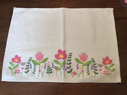 Make your table beautiful with these pretty spring placemats. Learn how to personalize them and create your own unique spring placemats using the Cricut and the Cricut Easypress