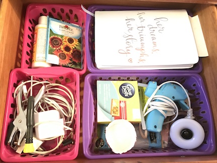 Organize your craft drawers with baskets and crayon boxes from the dollar store. 