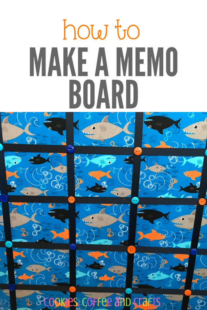 My son has many pictures and art projects and needed a place to display them. A DIY memo board was the perfct idea covered in shark fabric to hang on his wall. It's decorative and useful. #MemoBoard #Fabric #HomeDecor #DIY #Kids #ForKids #Ribbon #Sharks #BoysRoom