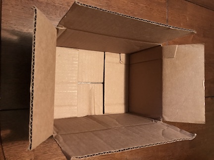 Learn how to create a Ghostbuster Centerpiece using a box.