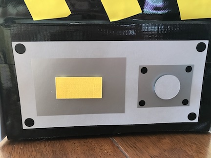 Learn how to create a Ghostbuster Centerpiece using a box.