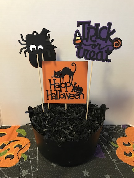 Halloween Centerpiece made with Cricut for a budget friendly kid party centerpiece 