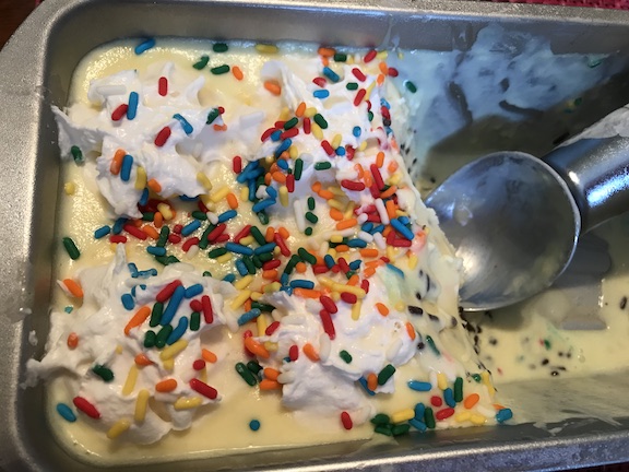 Making homemade ice cream is easy and fun. This no churn cake batter ice cream is perfect for the kids. Great for a birthday party too. #IceCream #Homemade #Kids #EasyRecipe #Summer #BirthdayParty #BirthdayIdeas #Homemadeicecream #Nochurn #Fun 