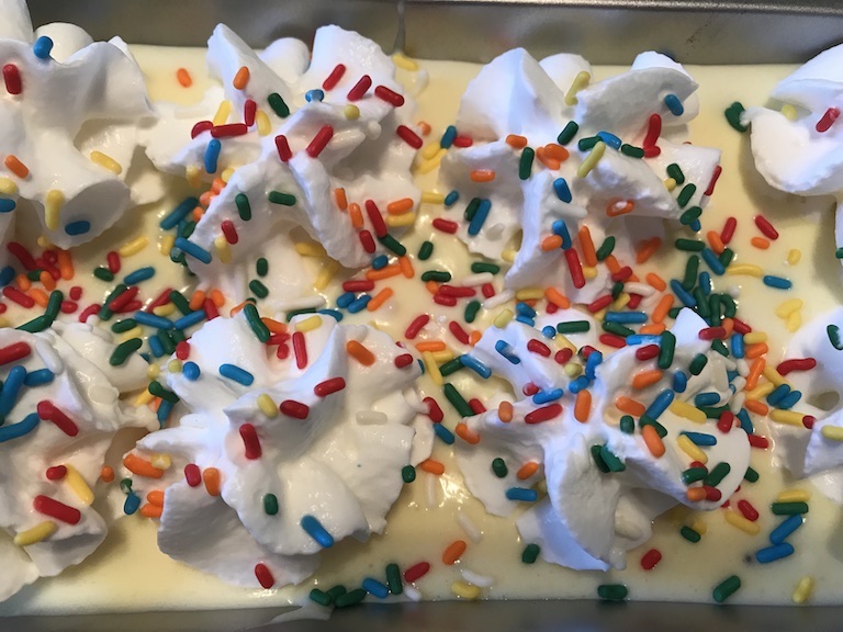 Making homemade ice cream is easy and fun. This no churn cake batter ice cream is perfect for the kids. Great for a birthday party too. #IceCream #Homemade #Kids #EasyRecipe #Summer #BirthdayParty #BirthdayIdeas #Homemadeicecream #Nochurn #Fun 