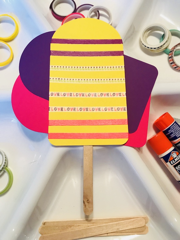 Add craft stick to Popsicle