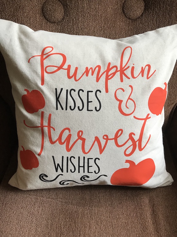 The best thing about owning a Cricut Maker and an EasyPress is creating your own pillows. I'm excited to have my Easypress this year to make some fall pillows using pillow covers and inserts. Follow this tutorial to make your own pumpkin pillow. #CricutMade #CricutEasyPress #Fall #DIY #Fallcrafts #falldecor #pumpkin #pumpkinideas #falldecorating