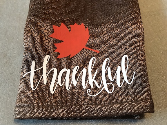 Thanksgiving is a time for family, gathering, blessings and being thanksful and the food! Setting a beautiful table is all a part of the Thanksgiving experience. These pretty napkins are a great idea for an easy DIY with your Cricut and EasyPress. Your table settings will look amazing. #Thanksgiving #ThanksgivingTable #Cricut #CircuEasyPress #DIY #ThanksgivingNapkins #Napkins #IronOn #ThanksgivingDecor #ThanksgivingIdeas #ThanksgivingwithFriends