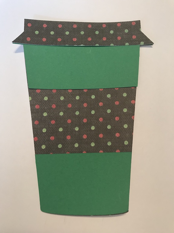 Gift cards make easy gifts, but aren't very pretty. Make your gift cards stand out in this easy to make coffee cup gift card holder for Christmas. Just find some pretty scrapbook paper and your Cricut, and get this DIY started. #DIY #Cricut #CricutMade #Coffee #GiftCardHolder #Christmas #ChristmasGift #ChristmasIdea #Xmas #scrapbook #Scrapbooking #tutorial 