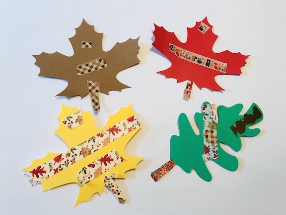  Celebrate fall with this easy fall leaves washi tape craft for kids of all ages, from toddlers to preschool to kindergarten. Washi tape is fun to use and the kids will love using the different patterns of tape. It's also great for scissor practice. #Toddlers #Preschool #Kindergarten #WashiTape #KidsCrafts #Fall #FallIdeas #falldecor #Kidfun #Creative #Create #FallLeaves #Cookiescoffeeandcrafts