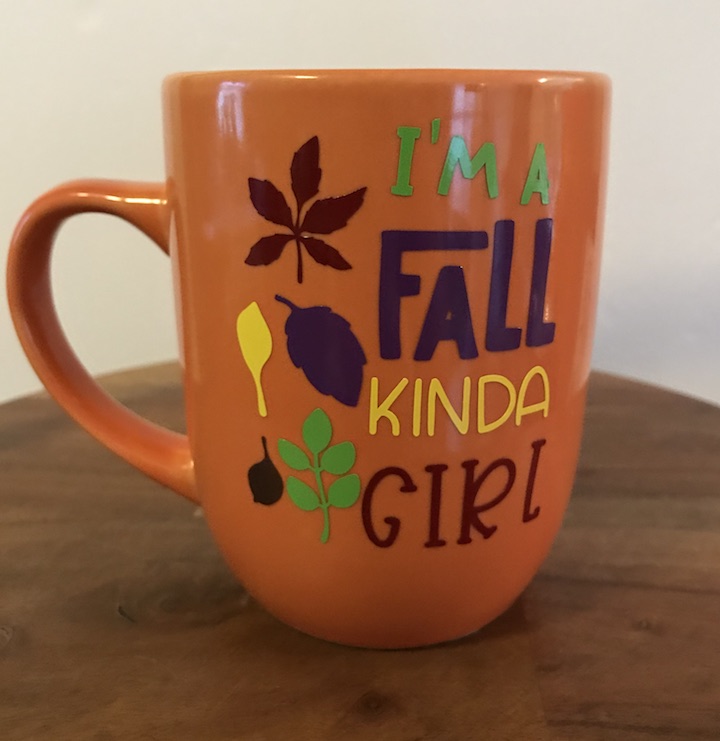 Enjoy fall and your mornings by drinking your favorite drink out of a cute and cozy mug. All you need is a mug and vinyl, then enjoy this easy DIY for Autumn. #Fall #FallDecor #FallIdeas #FallGirl #Love #Coffee #PumpkinSpice #DIY #Vinyl #DollarStore #CricutMade #Cricut