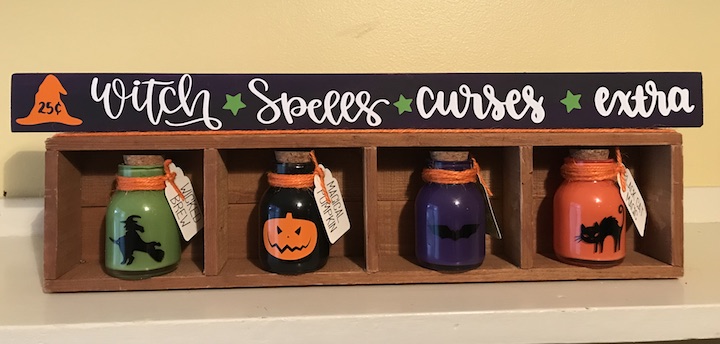 Halloween Potion Bottle Shelf on Display