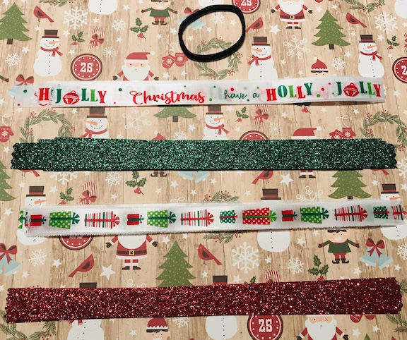 My daughter loves to wear her hair in a ponytail. Plain black hair ties/elastic are so boring. Learn how to make a cute DIY glittery Christmas ponytail holder with ribbon. #Christmas #Ponytail #DollarTree