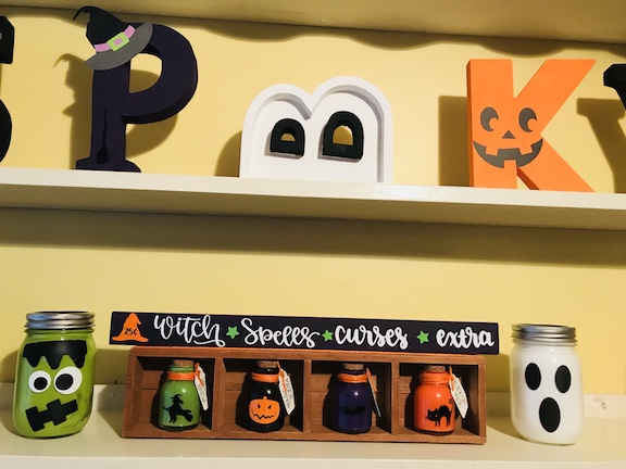 Halloween Potion Bottles on Display shelf for Halloween