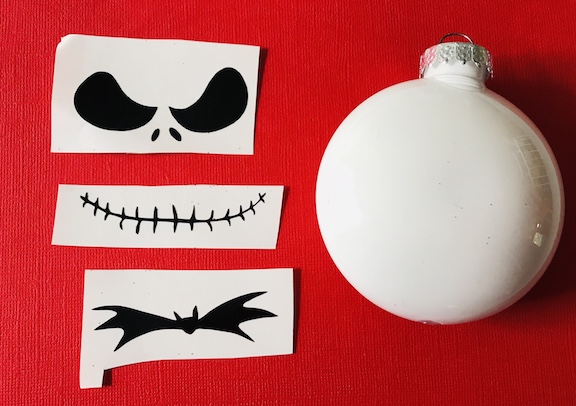 Tim Burtons The Nightmare Before Christmas is my son's favorite movie. If you know anyone who loves this Disney Classic, learn how to make a DIY Jack Skellington Christmas Ornament. It looks great on a Halloween tree too! #JackSkellington #Christmas #ChristmasOrnmanent #DIY 