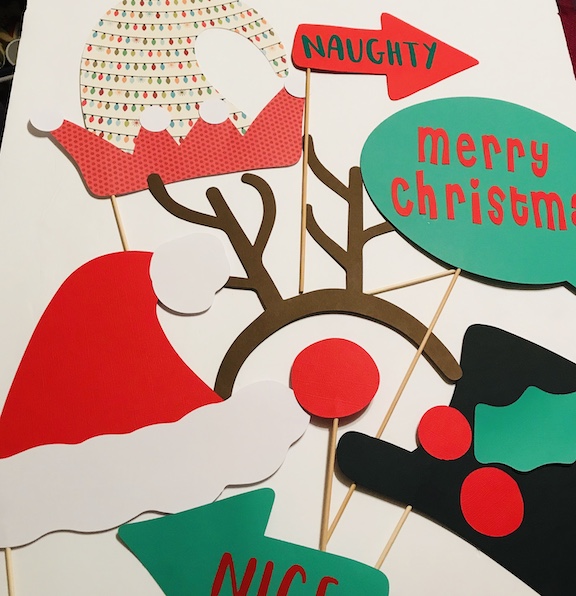 Fun collection of Christmas photo booth props made with Cricut
