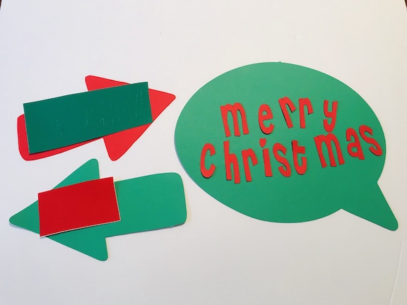 Fun Merry Christmas speech bubble and naughty and nice arrows 