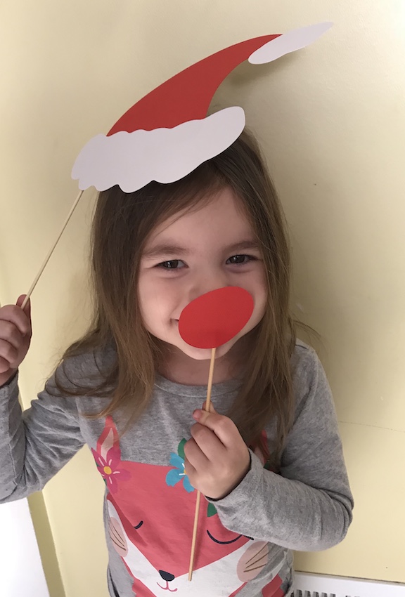 Kids having fun with Christmas Photo Booth Props 