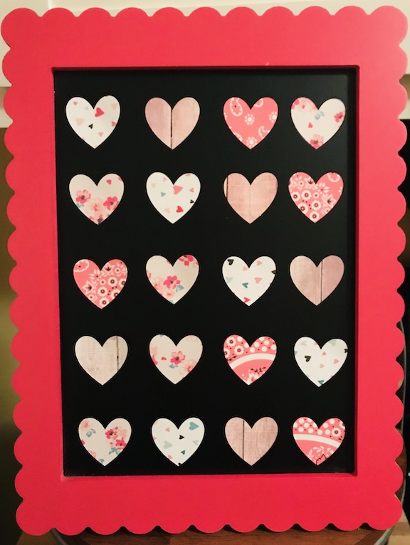 Create simple Valentine's Heart Specimen Art with pretty scrapbook paper. These paper hearts will make a pretty decoration idea from the dollar store. Just follow this easy tutorial. #ValentinesDay #ValentinesDayCraft #PaperCrafts #PaperCraftsIdeas #Valentinesdaydecorations