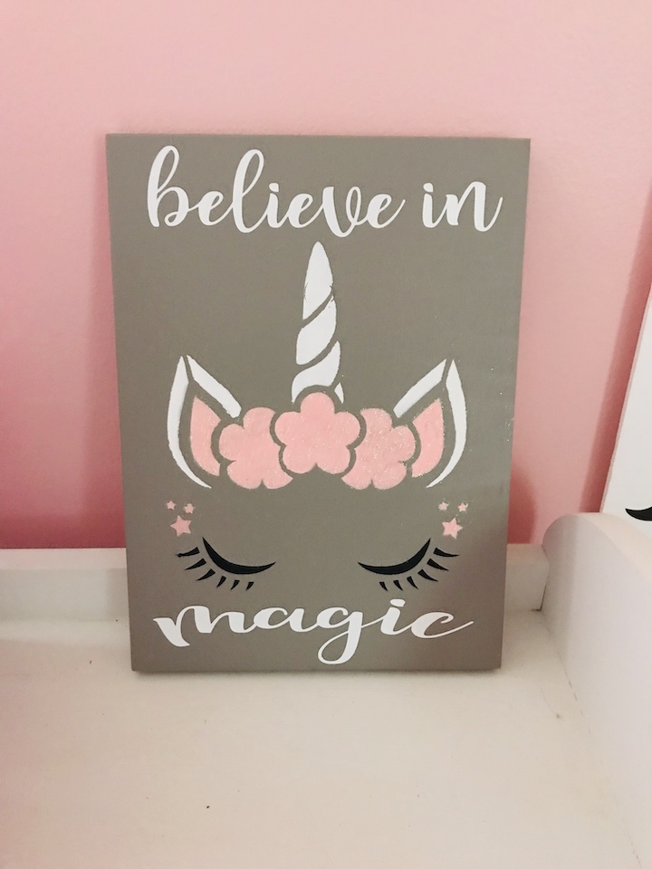 Perfect wooden sign for a girls room that loves unicorns. Create this awesome painted sign and add a saying with your Cricut. This unicorn makes fun wall art for any bedroom. #Unicorn #GirlsBedroom #KidsBedroomIdeas #Stencils #DIY #wooden