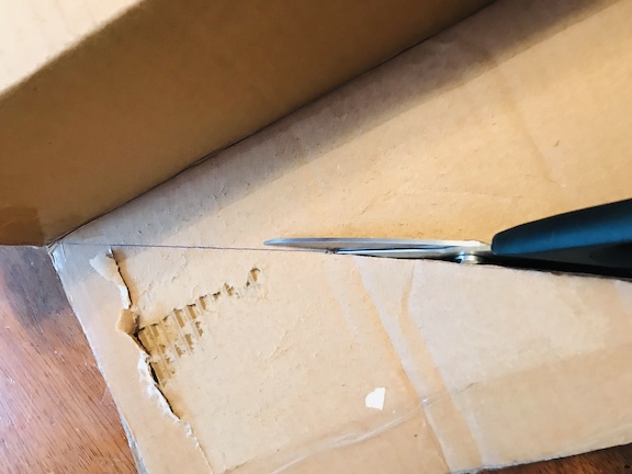 All you need is a cardboard box, a ruler and tape to make a fun, cheap and simple party game. The kids will love having an indoor cornhole game to play. It's perfect for birthdays and school/class parties. #Kidsgames #Kids #Birthdaygames #Classparty #cardboard #cardboardcrafts #DIY 