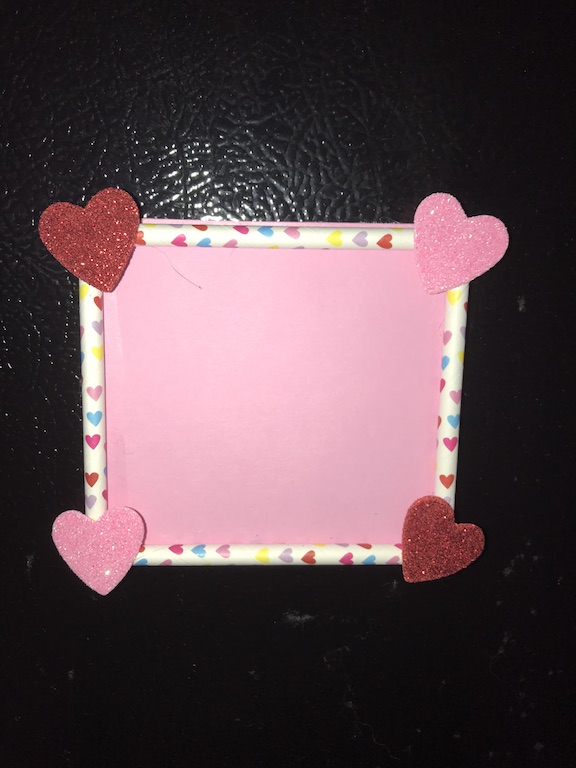 Create a cute and fun picture frame with paper straws as a Valentine's Day Craft for kids. It's easy and makes a perfect gift for parents. Learn how to make this for preschool or elementary school and is perfect for a Valentine's Day Party. #ValentinesDay #Valentinesdayparty #ValentinesDayCraft #Kids #KidsCraft