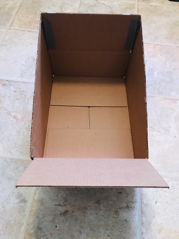 All you need is a cardboard box, a ruler and tape to make a fun, cheap and simple party game. The kids will love having an indoor cornhole game to play. It's perfect for birthdays and school/class parties. #Kidsgames #Kids #Birthdaygames #Classparty #cardboard #cardboardcrafts #DIY 