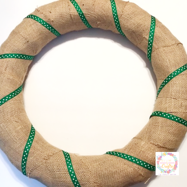 Add green polka dot ribbon to the burlap shamrock wreath 