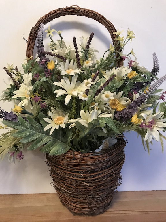 Thift Store Grapevine Basket find with old florals in it that gets a makeover