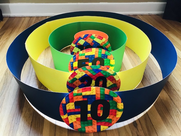 LEGO Skeeball game you can make with Cricut, pasteboard and plates