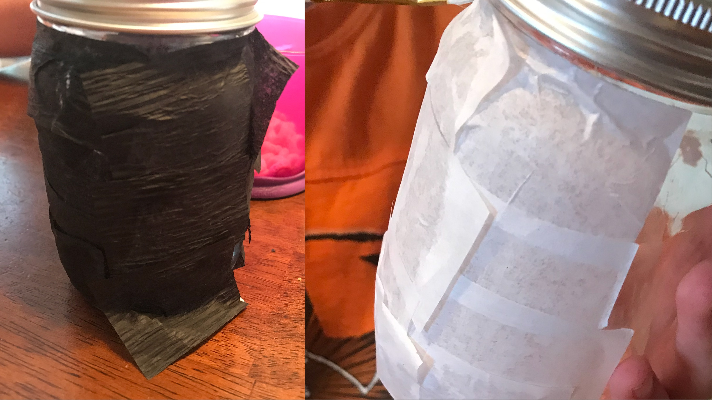 Mod podge and tissue paper covered plastic jars for DIY Halloween Lantern Decorations 