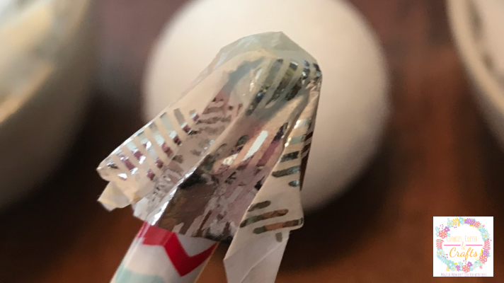 Adding Tissue Paper to the styrofoam ball