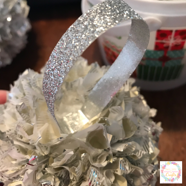 Adding sparkly ribbon to DIY Pom Pom 