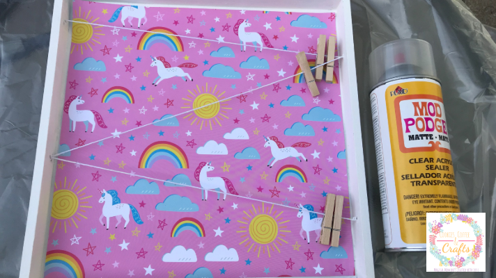 Clear Mod Podge Spray to Seal the cute unicorn clothespin picture holder