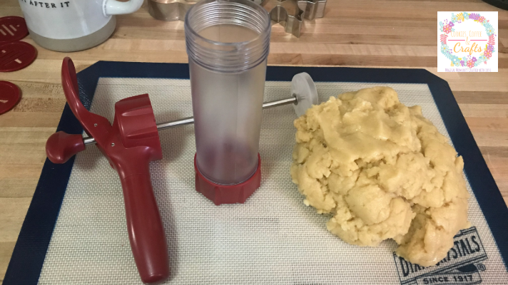 Getting ready to put cookie dough recipe in cookie press to make Christmas treats