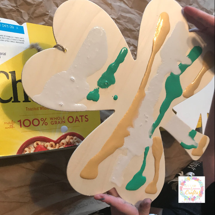 Easy Kids Paint Pouring on Dollar Store Shamrock