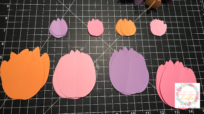 Paper Cut into tulip shapes to make easy Cricut 3D Paper Flowers