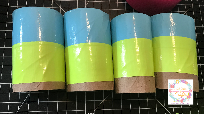 Toilet paper rolls covered in duct tape for Trolls World Tour Techno Bracelets