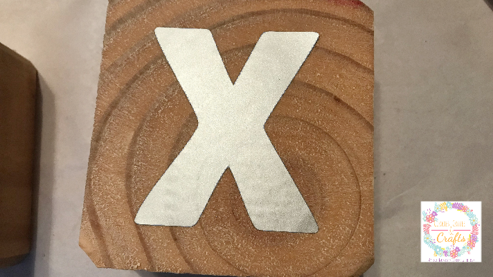 x on the 4x4 block in removable vinyl to stencil around