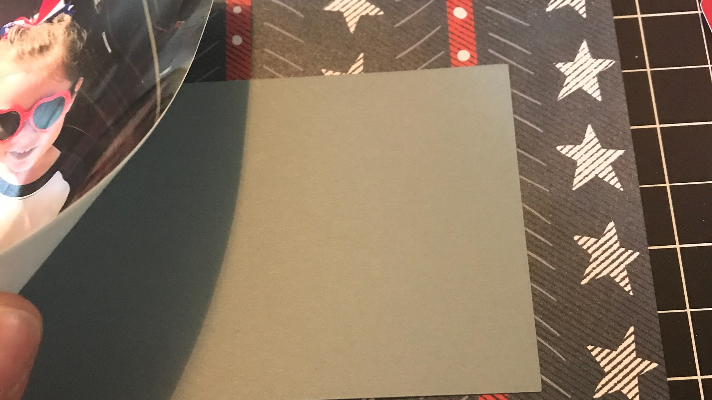 Putting together the 4th of July scrapbook page with Cricut 