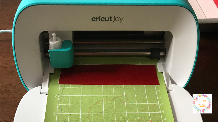 Using the Cricut Joy to decorate the patriotic book stack for the 4th of July decorations 