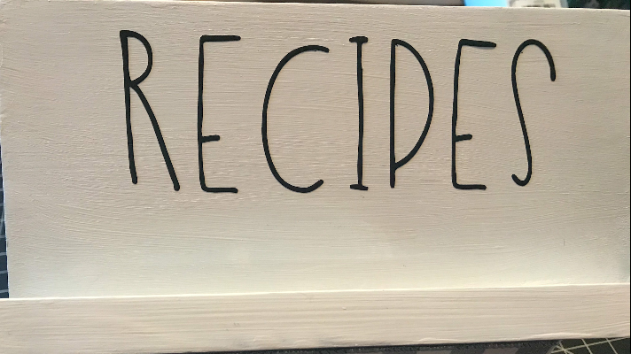 Adding the word recipes to the top of the wood recipe box